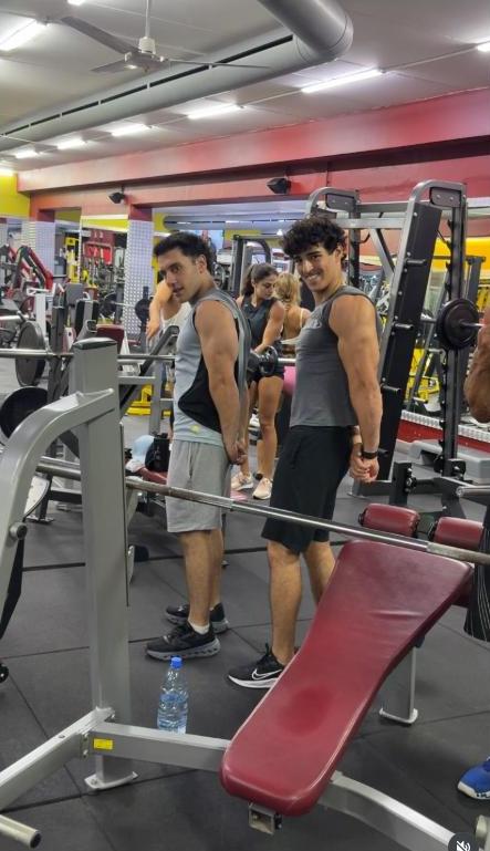 Two members training on gym equipment at Be Pro Gym
